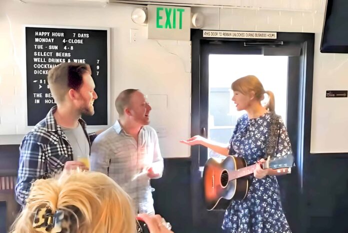 taylor-swift-shocks-fans-by-surprise-performance-at-engagement-party